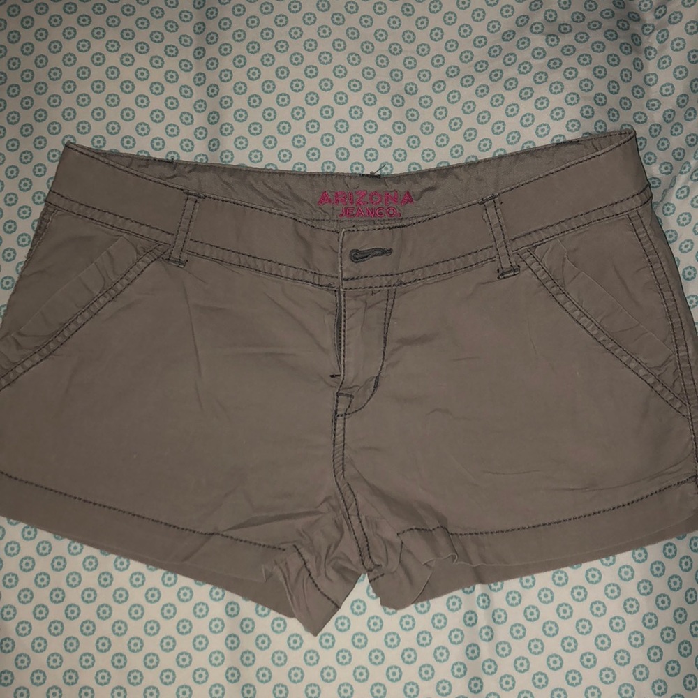 Gray low rise buttoned shorts. stretch fit.